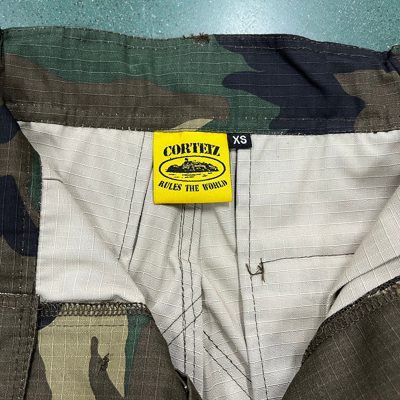 Calça Corteiz Cargo Camuflada