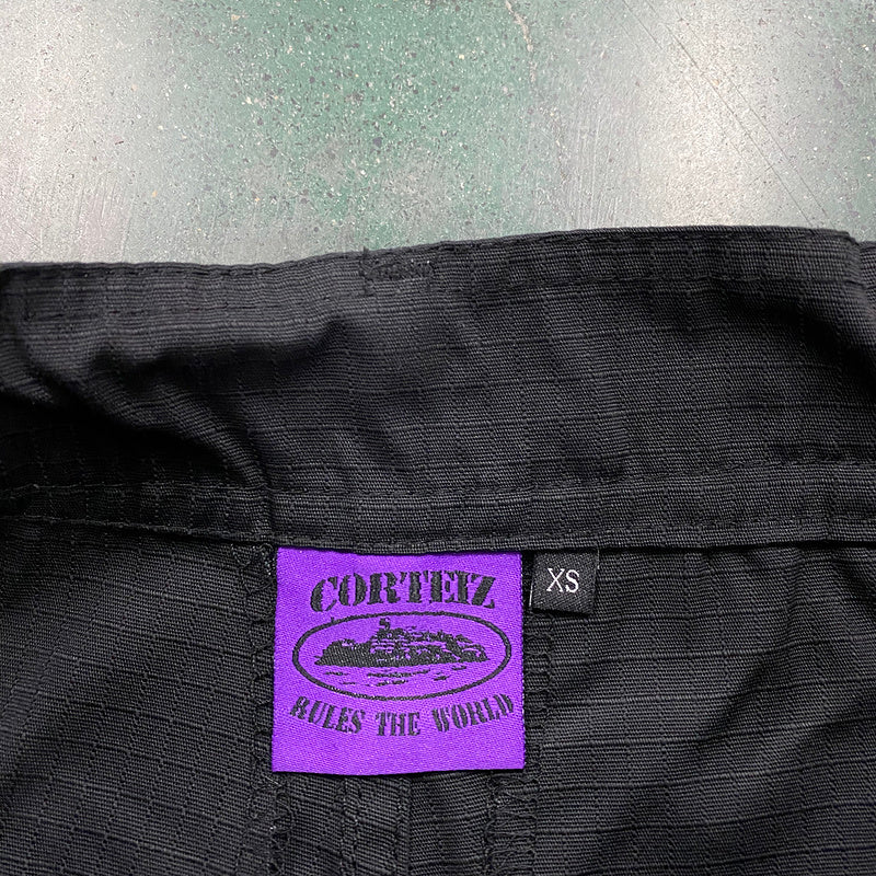 Calça Corteiz Cargo Preto com Roxo