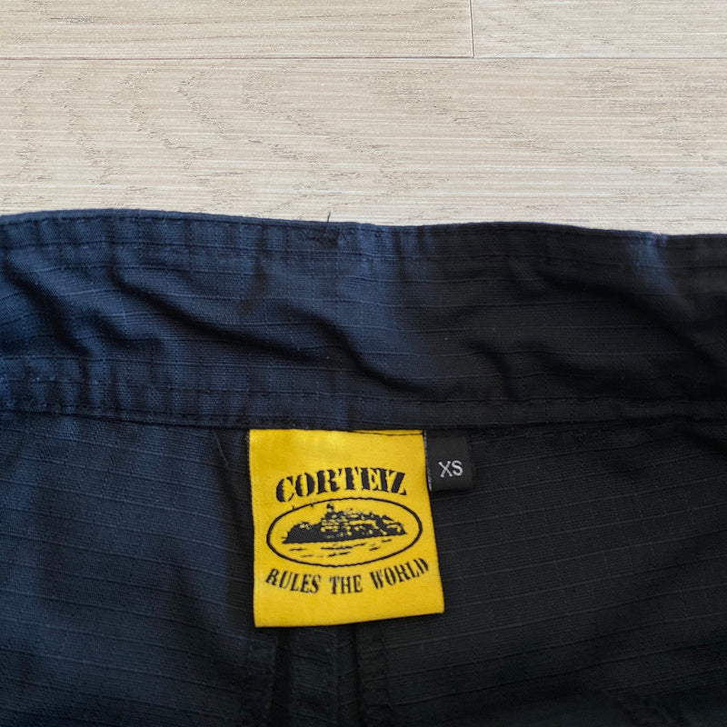 Calça Corteiz Cargo Preto com Amarelo