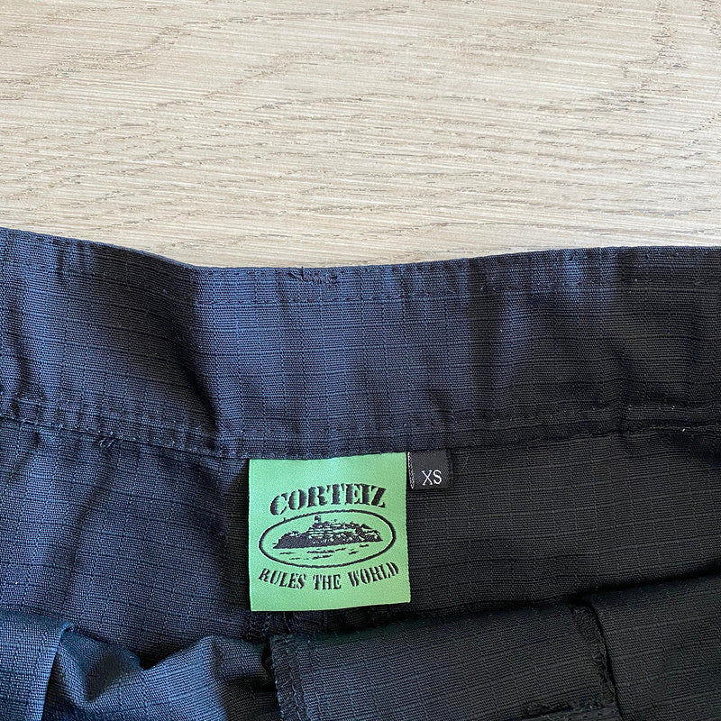 Calça Corteiz Cargo Preto com Verde